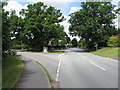 SO8751 : Road junction near Norton church by Peter Whatley