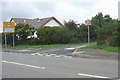 T-junction of the B 4422 and the link to the back lane on the outskirts of Rhostrehwfa