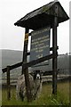 Shelter for sign and sheep.