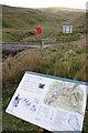 NT7908 : Chew Green, Roman Fort sign, Upper Coquet by Charlie Bell