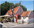 Colourful summery scene at the Fox Inn, Newbourne