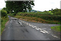 SN9868 : Road junction near Llwyncwtta Farm by Nigel Brown