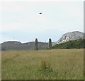 SH2280 : The standing stones of Penrhosfeilw viewed against Mynydd Twr by Eric Jones