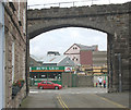 Huws Gray seen through the Church Street arch in Caernarfon