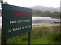 NM9742 : Warning Sign at Glen Dubh Reservoir by Iain Thompson