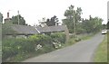 Traditional cottage and a stretch of disused road at the eastern end of Llansadwrn