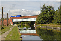 SJ6999 : A580 crosses Bridgewater Canal by Dave Green