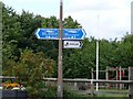 Signs for the Trans Pennine Trail with children