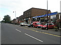 Adjacent garages in Beacon Hill Road