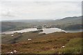 NG5041 : View from Ben Tianavaig trig point over Portree by Carol Walker