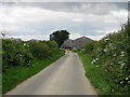 TR2540 : View along Cauldham Lane to Tumble Tye Farm by Nick Smith