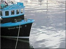 NU2232 : Boat in Seahouses harbour. by Nigel Mykura