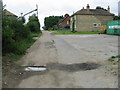 Farm road and bridleway past Poulton Farm Cottages