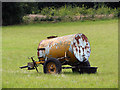 Water tank in pasture