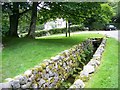 The mill lade which took the water from the mill pond to the mill