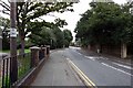 Road past Holy Trinity Church, Abridge, Essex
