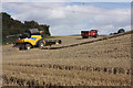 SE9239 : Harvesting on the Wolds above North Newbald by Peter Church