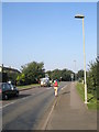 Jogger heading out of Deddington on the B4031