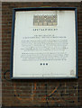 Plaque giving details of restoration of St Botolph