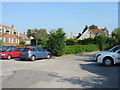 View across the Chequers car park to the Church