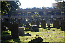 TQ8885 : Graveyard next to The Royals car park. by william