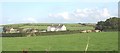 SH3383 : View across farmland to Ger yr Afon and Bodloigan Farms by Eric Jones