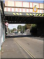 View under the railway bridge looking towards the Aldershot Town  F.C ticket office