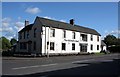 The Old Bulls Head on the road Junction in the sun.